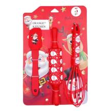 Cukrářská sada stěrka, váleček a šlehací metla červená s vánočním motivem (3 ks)