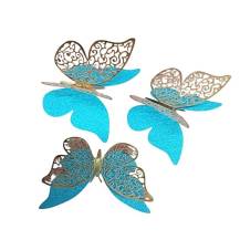 Nejedlá dekorace tyrkysovo-zlatá Motýlci (12 ks)