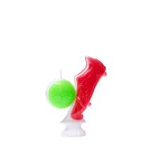 Red soccer ball candle with green ball